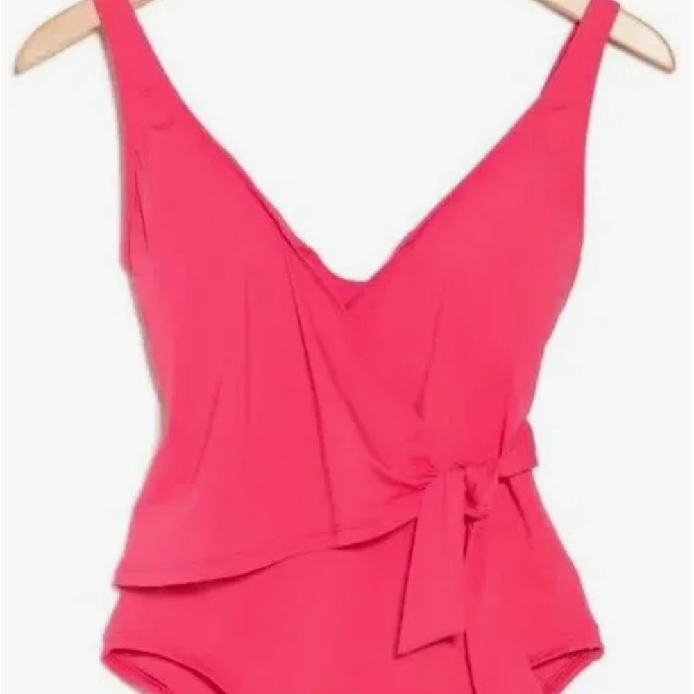 Tommy Bahama coral surplice one piece swim suit. New without tags, never worn.